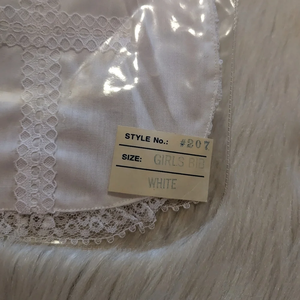 Vintage Keepsake white bob with lace trim and cross